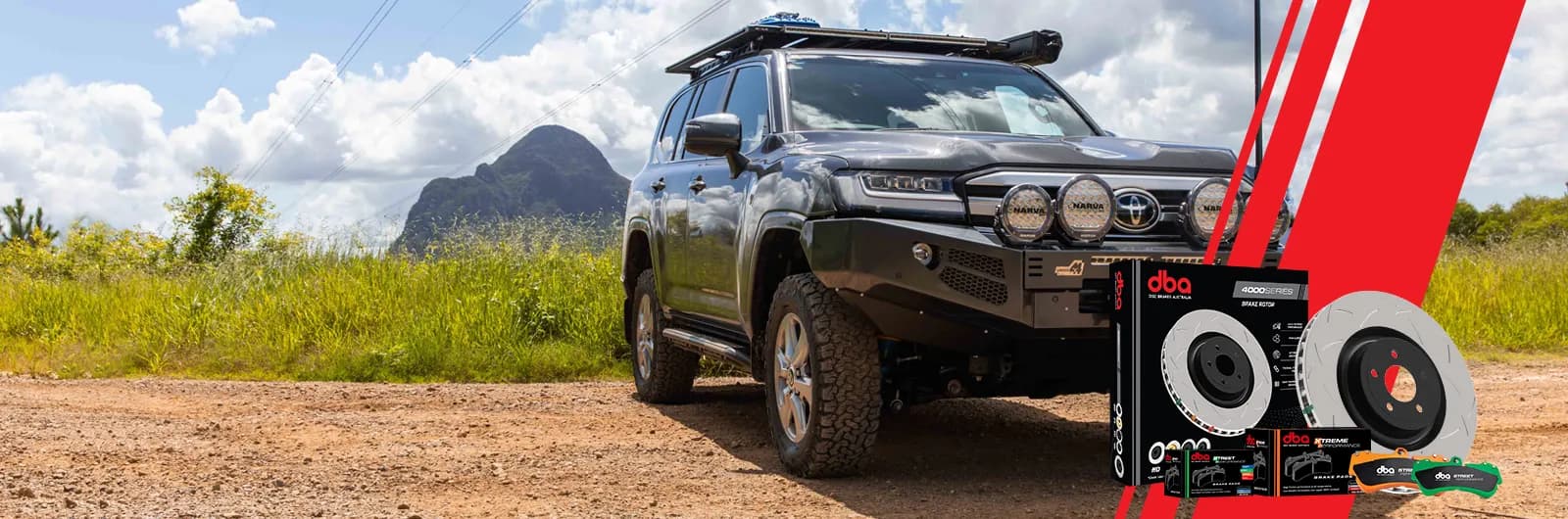 Toyota Land Cruiser en una pista de tierra del outback junto a los embalajes de discos y pastillas DBA 4000 Series