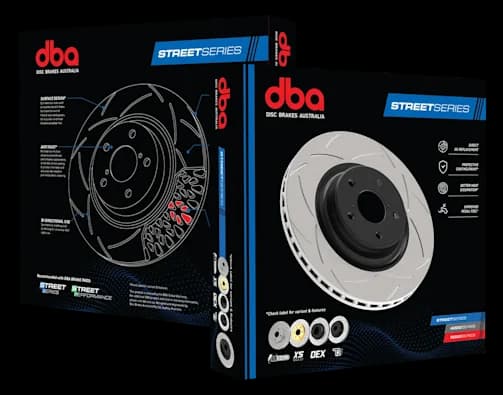 Empaque DBA Street Series mostrando caja con diagrama detallado a la izquierda y disco ranurado real a la derecha